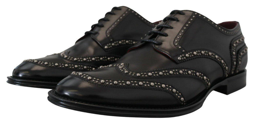 Chaussures Derby en cuir noir Dolce & Gabbana avec clous, style élégant et sophistiqué pour femmes.