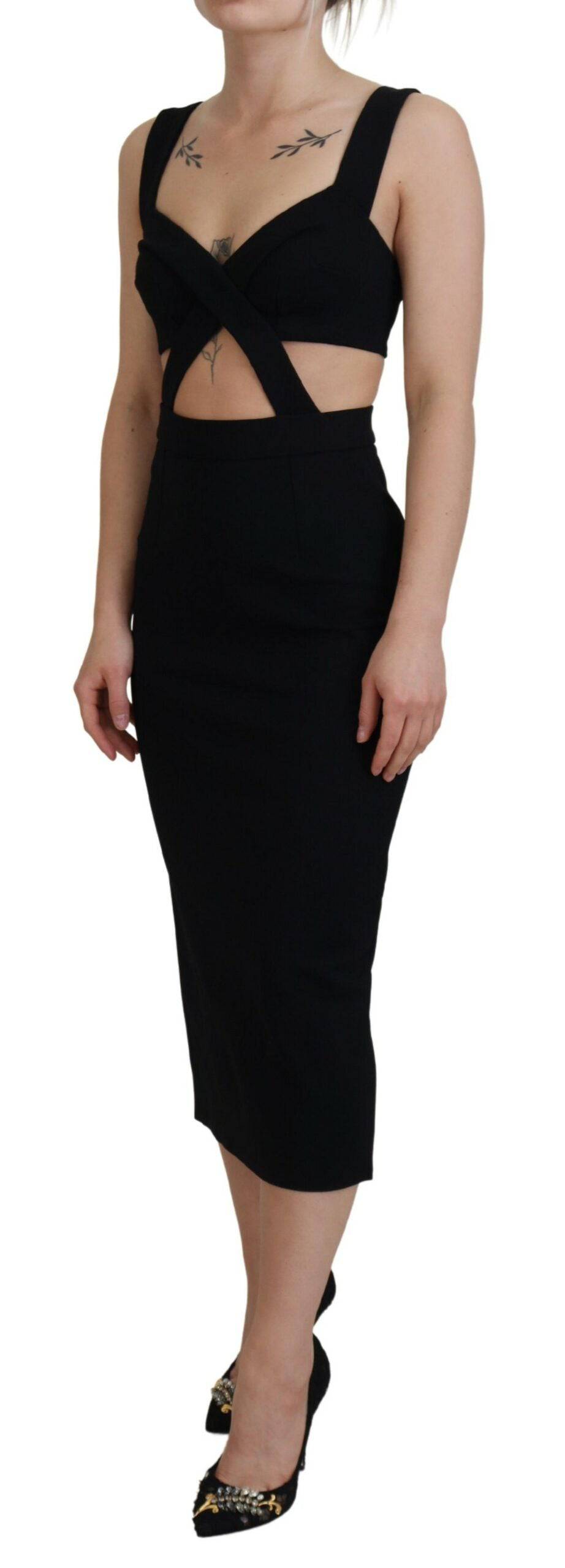 Robe midi noire en viscose de style bodycon de Dolce & Gabbana, ajustée et élégante, portée sur un mannequin.