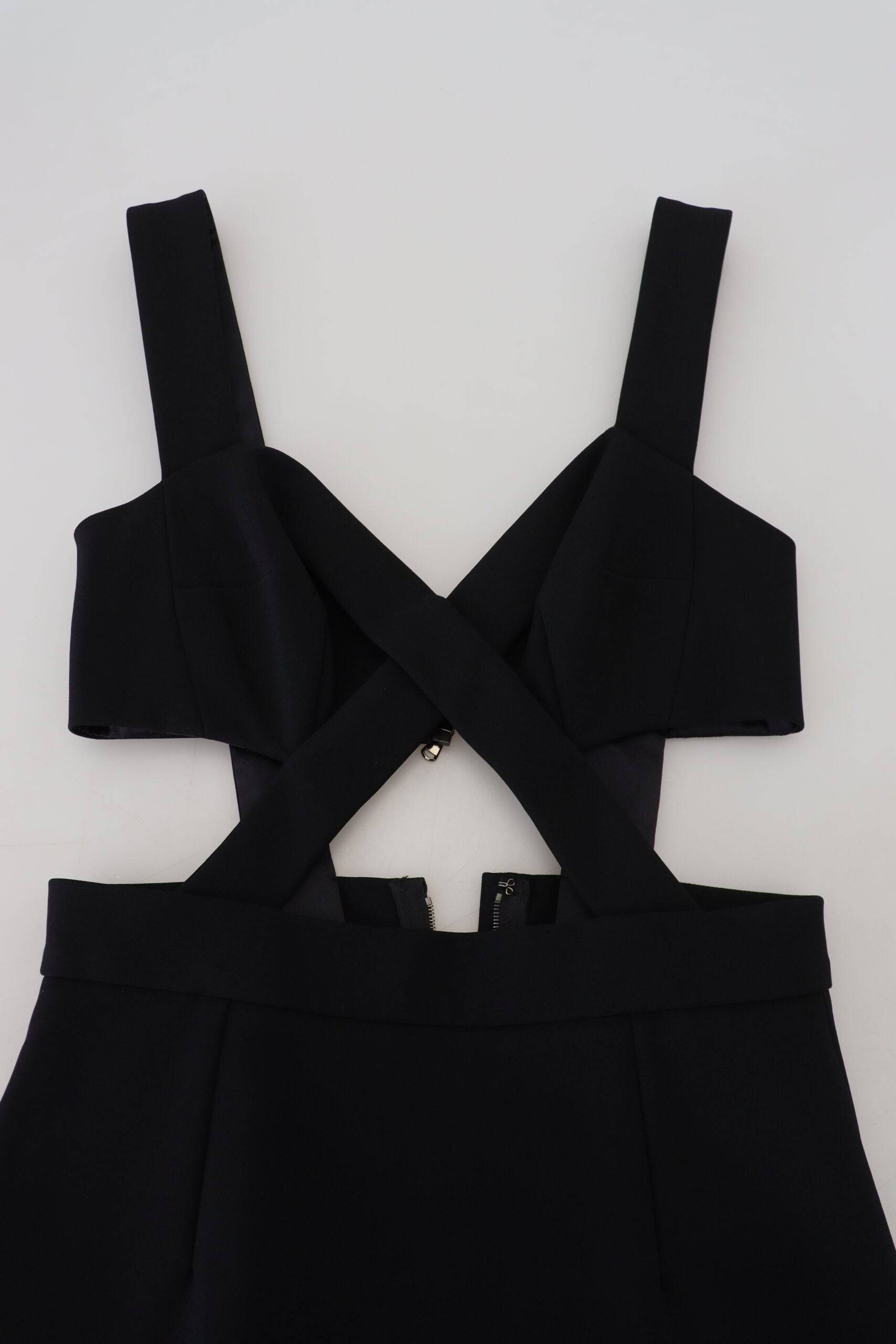 Robe midi en viscose noire de coupe ajustée Dolce & Gabbana, silhouette élégante et tissu fluide visible sur l'image.