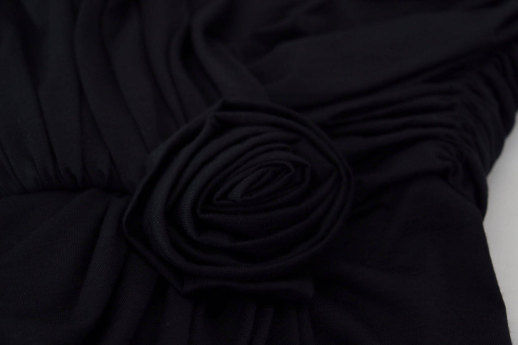 Robe noire Dolce & Gabbana en laine, robe portefeuille ajustée à une épaule, élégante et sophistiquée.