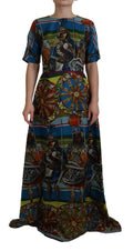 Robe longue en soie multicolore Dolce & Gabbana Sicily, coupe évasée, design élégant, détails colorés et sophistiqués.