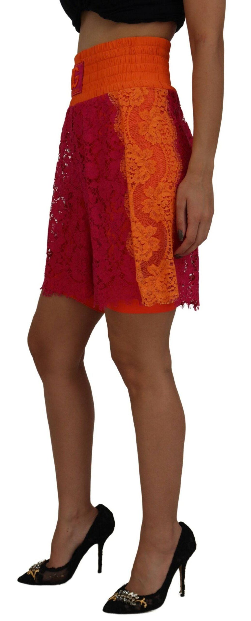 Shorts en coton rose et orange à dentelle à taille haute de Dolce & Gabbana, détails élégants et tissu léger.