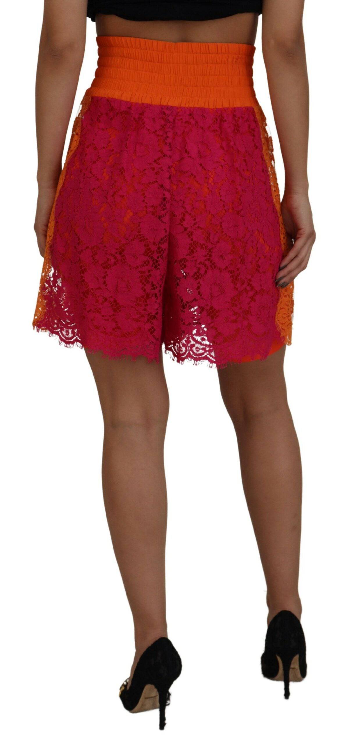 Shorts en coton rose et orange Dolce & Gabbana, taille haute avec dentelle, style élégant et féminin.