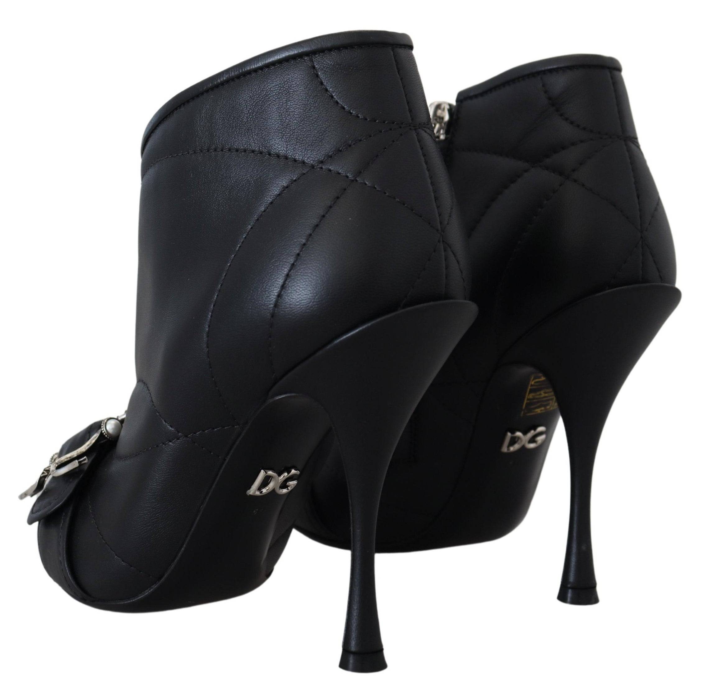 Bottes noires Dolce & Gabbana Devotion à quilting rembourré et boucle à la cheville, élégantes et tendance.