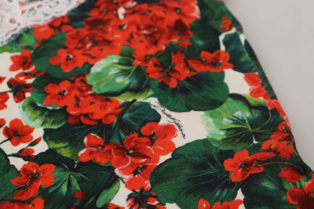 Débardeur en laine blanche Dolce & Gabbana avec motifs floraux en dentelle, sans manches, pour un style élégant et féminin.