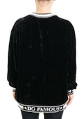 Pull en velours noir Dolce & Gabbana à col rond, vêtement élégant et confortable pour homme.