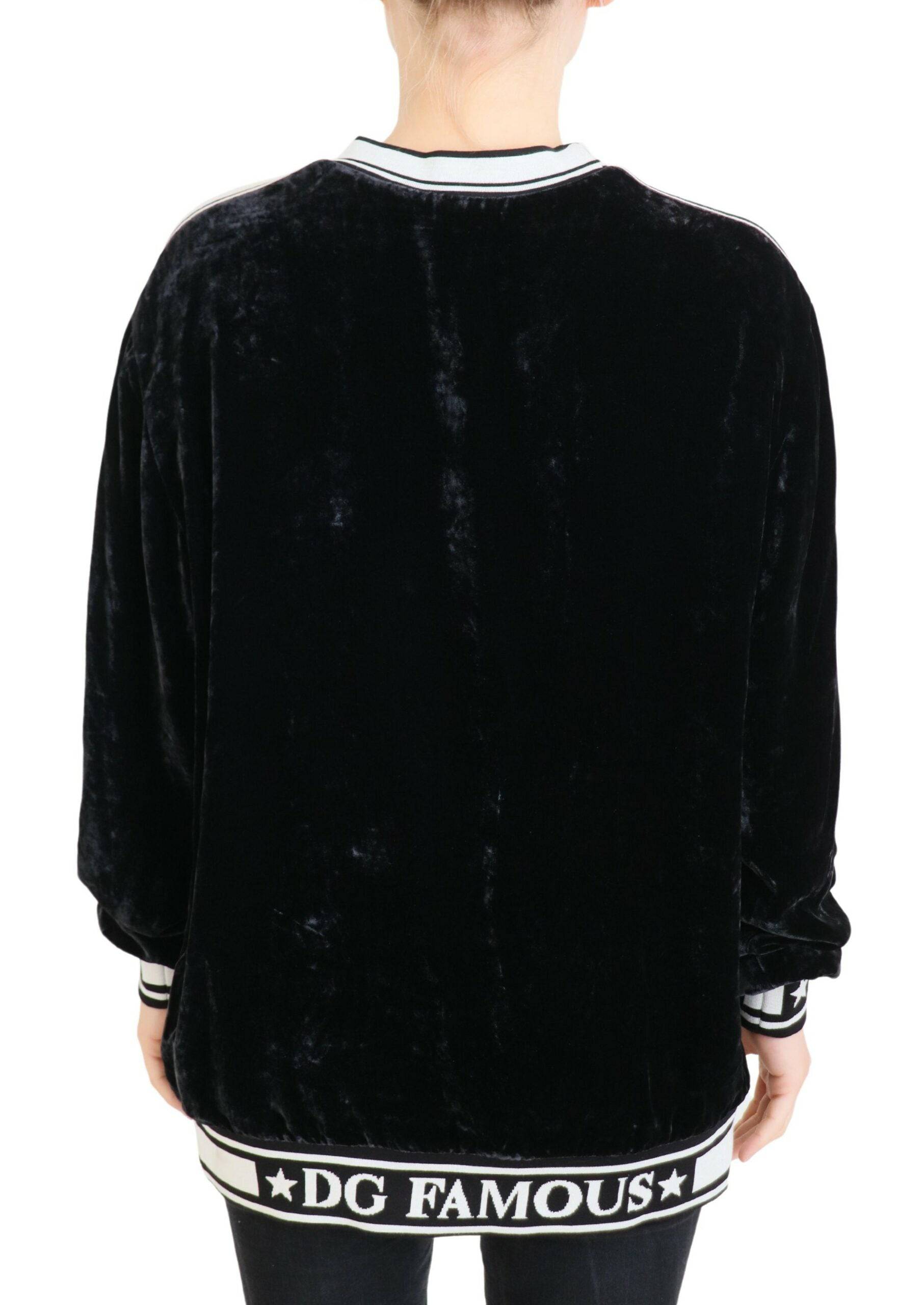Pull en velours noir Dolce & Gabbana à col rond, vêtement élégant et confortable pour homme.