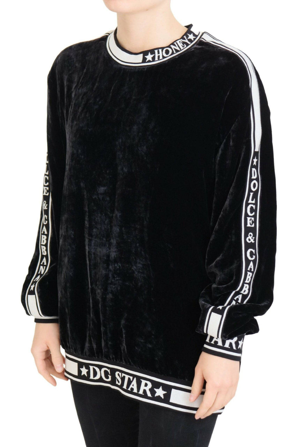 Pull en velours noir Dolce & Gabbana à col rond, pull-over élégant en tissu doux, parfait pour un style sophistiqué.