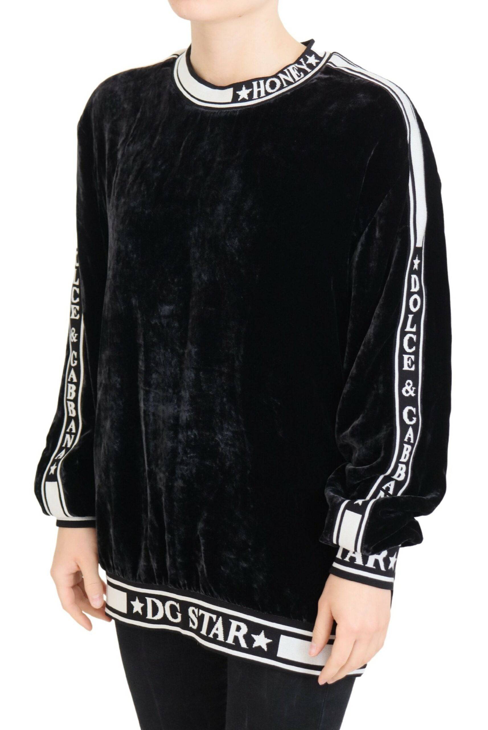 Pull en velours noir Dolce & Gabbana à col rond, pull-over élégant en tissu doux, parfait pour un style sophistiqué.