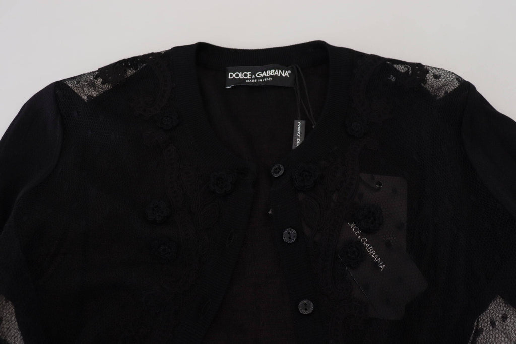 Cardigan noir en dentelle florale avec boutons de la marque Dolce & Gabbana, vue de face.