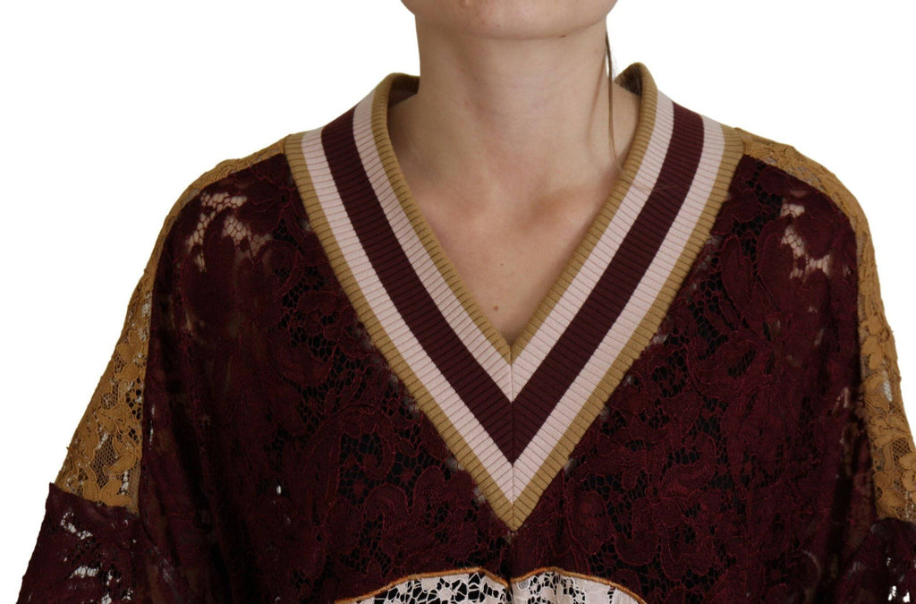 Pull en tricot Dolce & Gabbana à col en V en dentelle multicolore, mode élégante et sophistiquée pour femme.