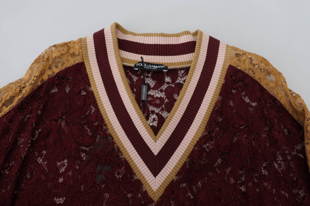 Pull en tricot Dolce & Gabbana à motifs multicolores avec col en V et dentelle, élégant et confortable.