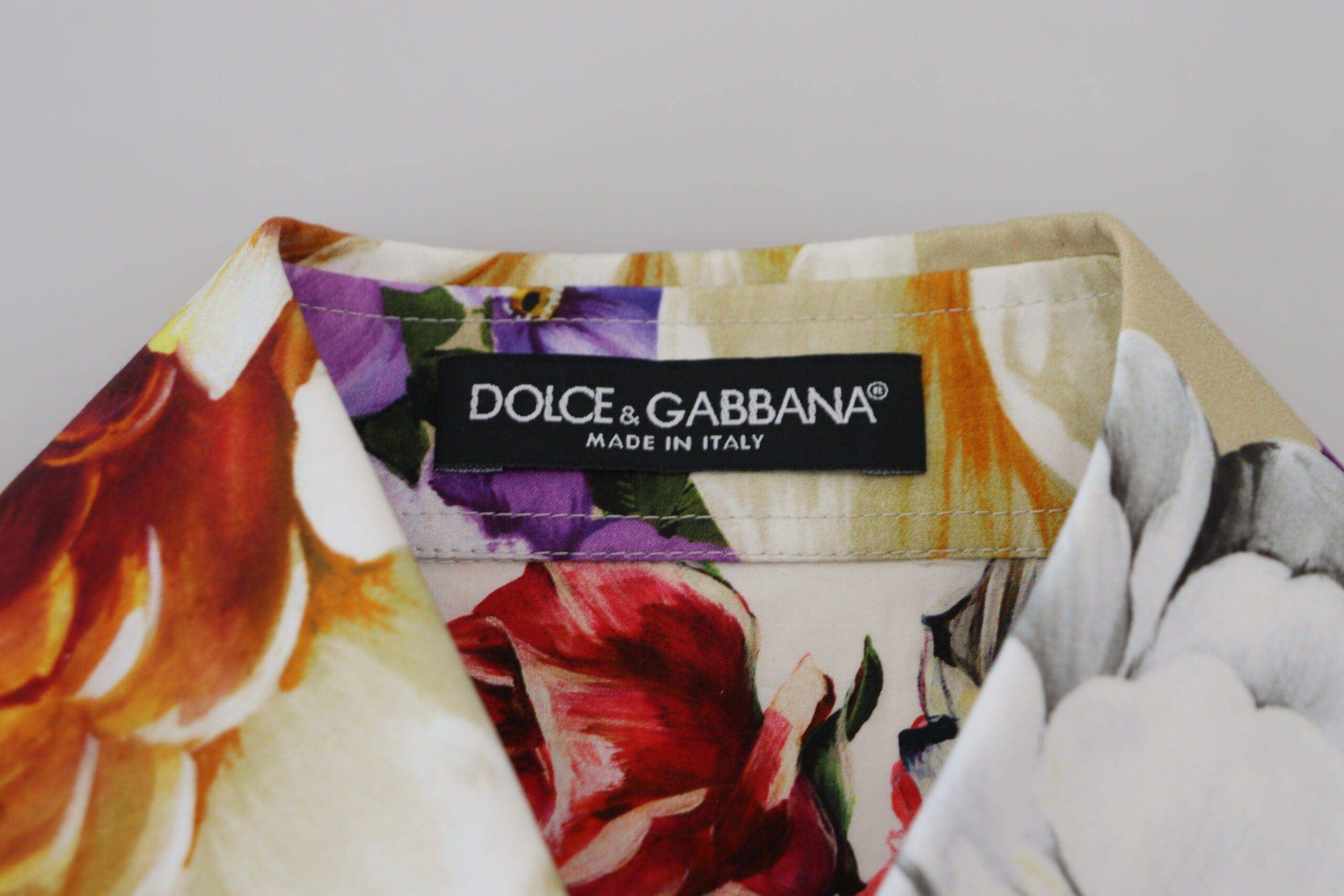 Chemisier Dolce & Gabbana à fleurs multicolores en coton avec col, détail floral et style élégant visible sur l'image.