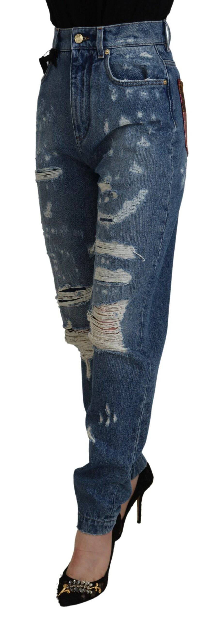 Jeans skinny en coton déchiré bleu Dolce & Gabbana avec détail tattered, mode élégante et décontractée.