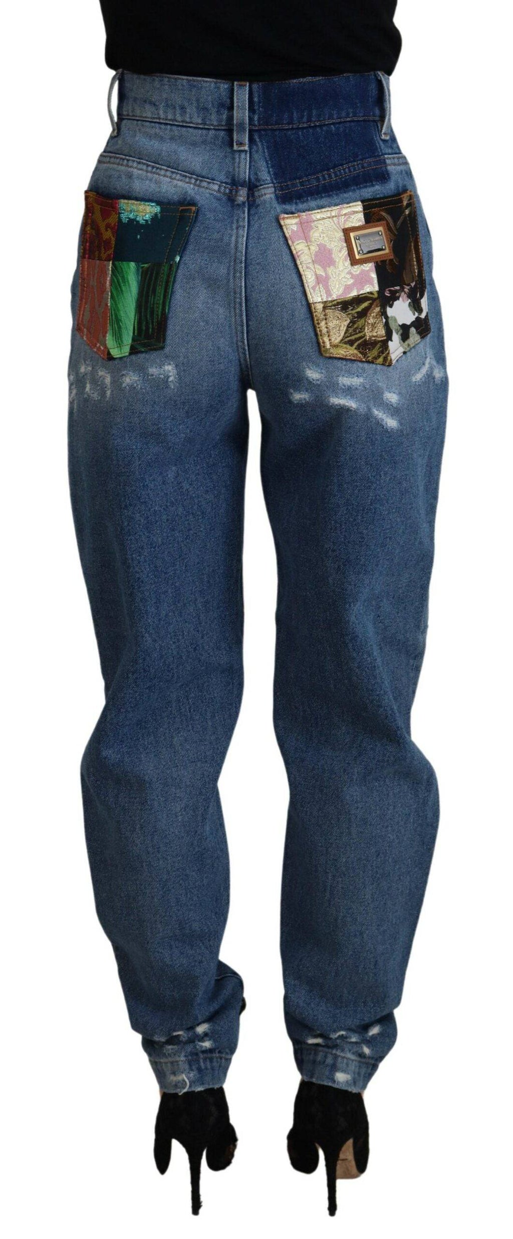 Jeans skinny en denim bleu tattered de Dolce & Gabbana, coupe ajustée, avec détails déchirés et coton confortable.