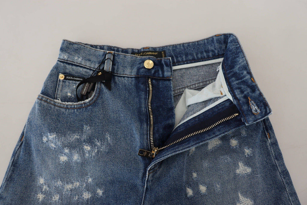 Jean skinny en denim bleu déchiré de Dolce & Gabbana, coupe moulante en coton, style décontracté et tendance.