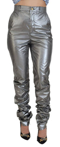 Pantalon skinny taille haute en métal argenté de Dolce & Gabbana, coupe ajustée et élégante, visible sur l'image.