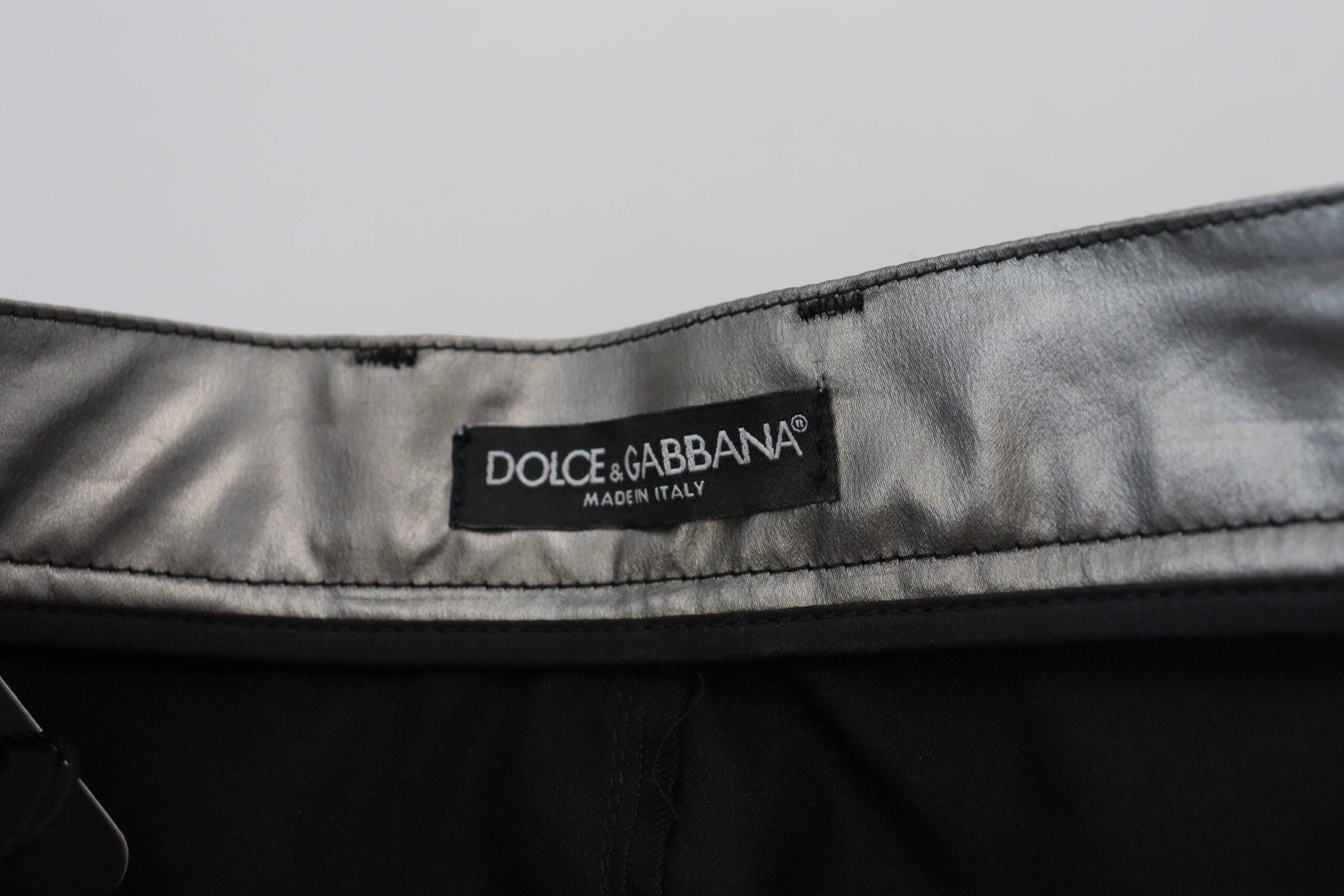 Pantalons skinny taille haute en métal argenté de Dolce & Gabbana, style élégant et moderne, en tissu brillant.