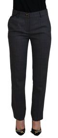 Pantalons pour femmes en laine à rayures gris de Dolce & Gabbana, coupe tapered, élégants et modernes.
