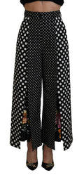 Pantalon à taille haute Dolce & Gabbana à pois multicolores, style élégant avec motif à pois colorés.