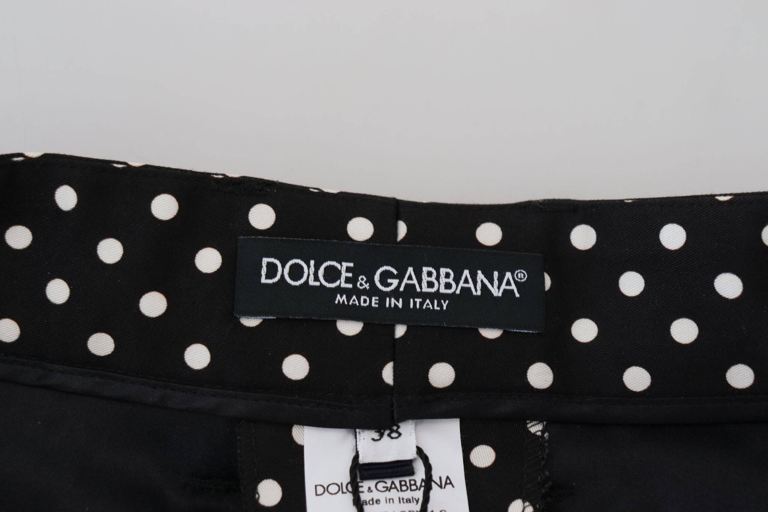 Pantalons taille haute à pois multicolores de Dolce & Gabbana, mode élégante et sophistiquée, en tissu léger et fluide.