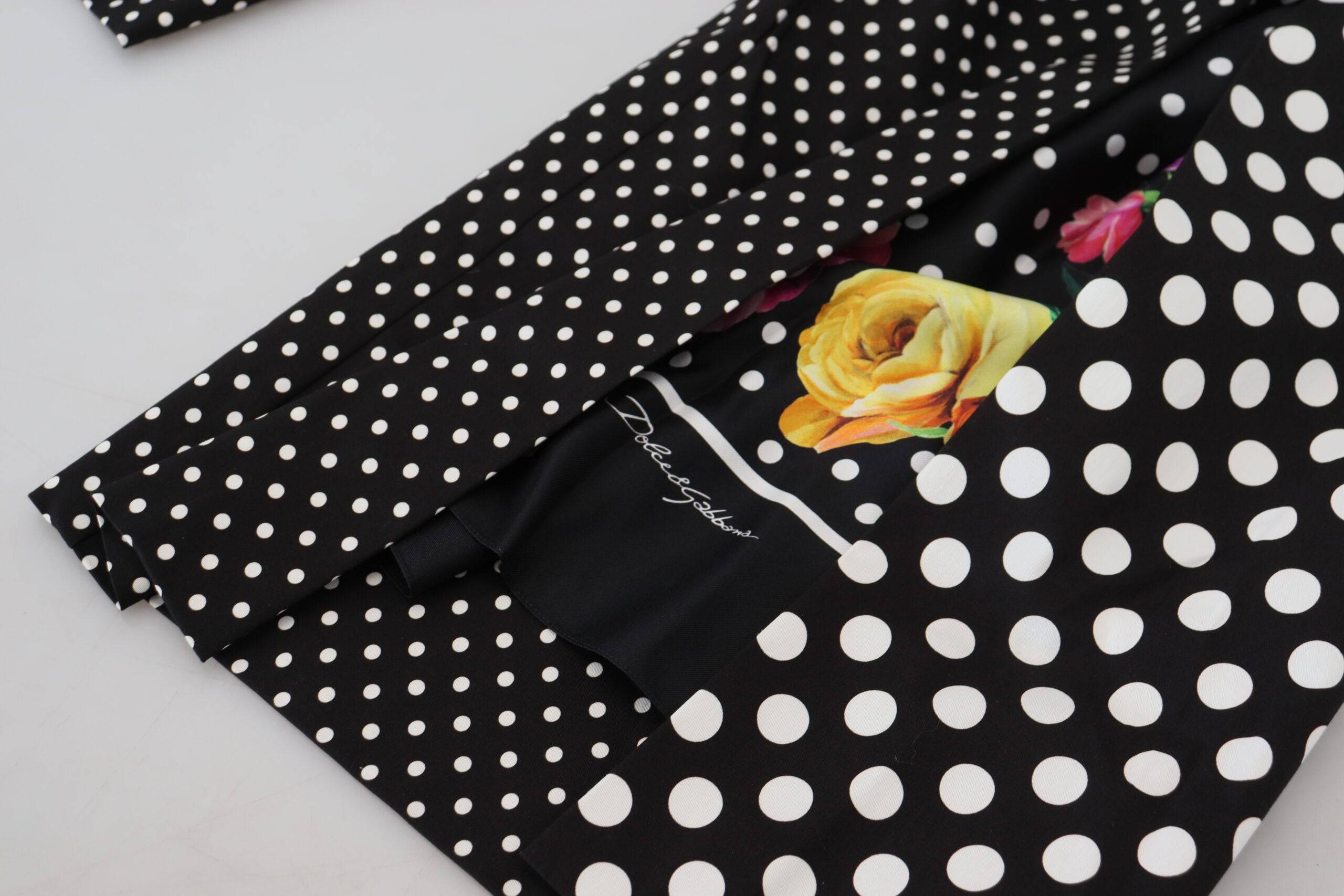 Pantalons Dolce & Gabbana à pois multicolores à taille haute, style élégant et tendance, en tissu fluide.