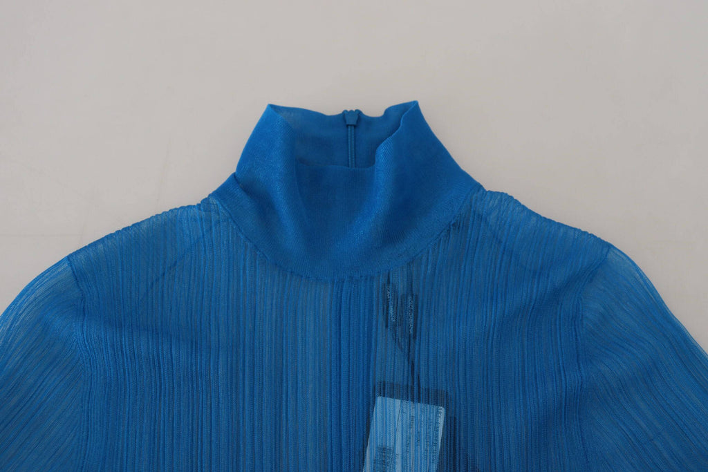 Blouse longue en maille bleue Dolce & Gabbana avec col roulé et manches longues, élégante et moderne.