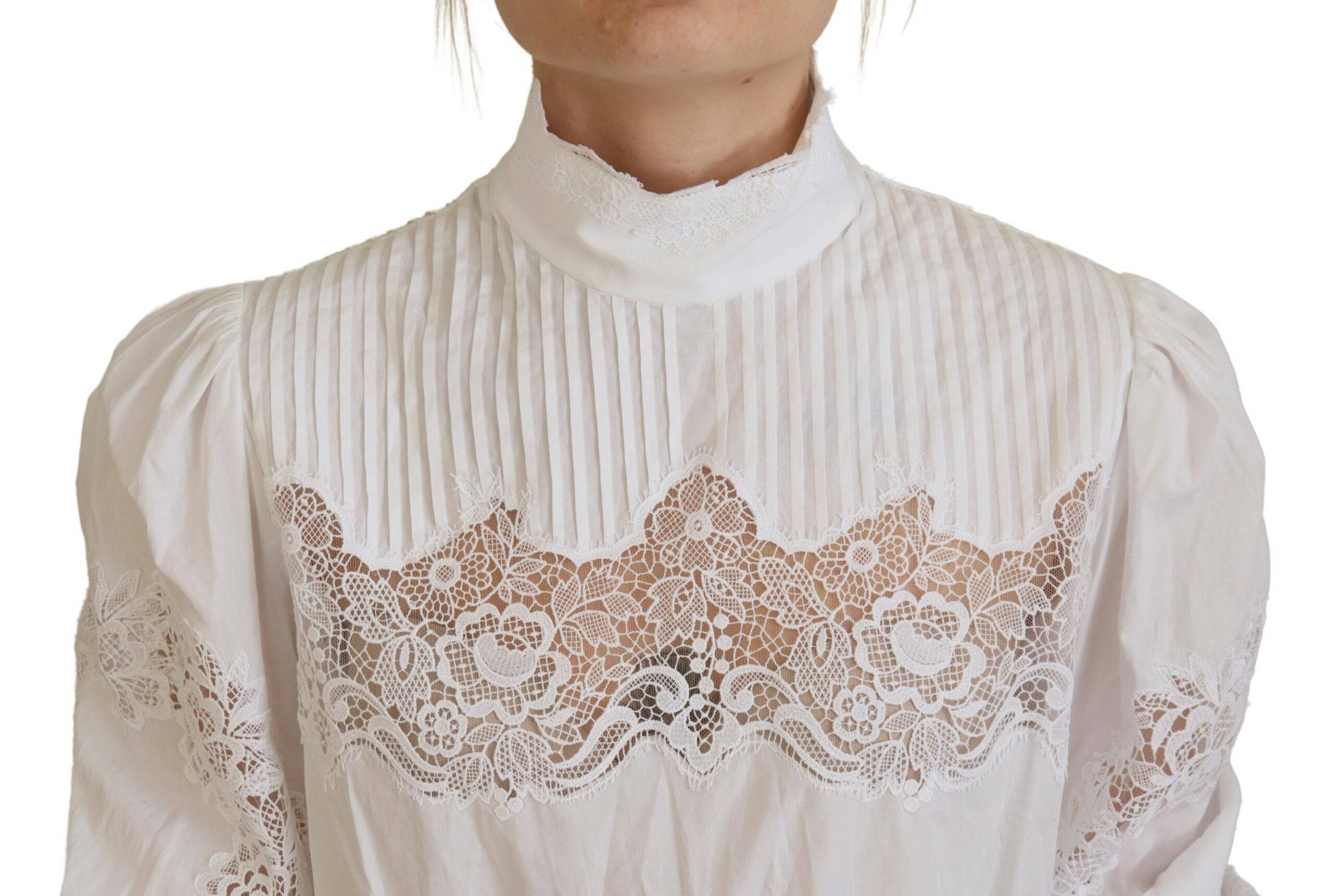 Blouse blanche en coton avec dentelle encolure roulée Dolce & Gabbana, élégante et sophistiquée.