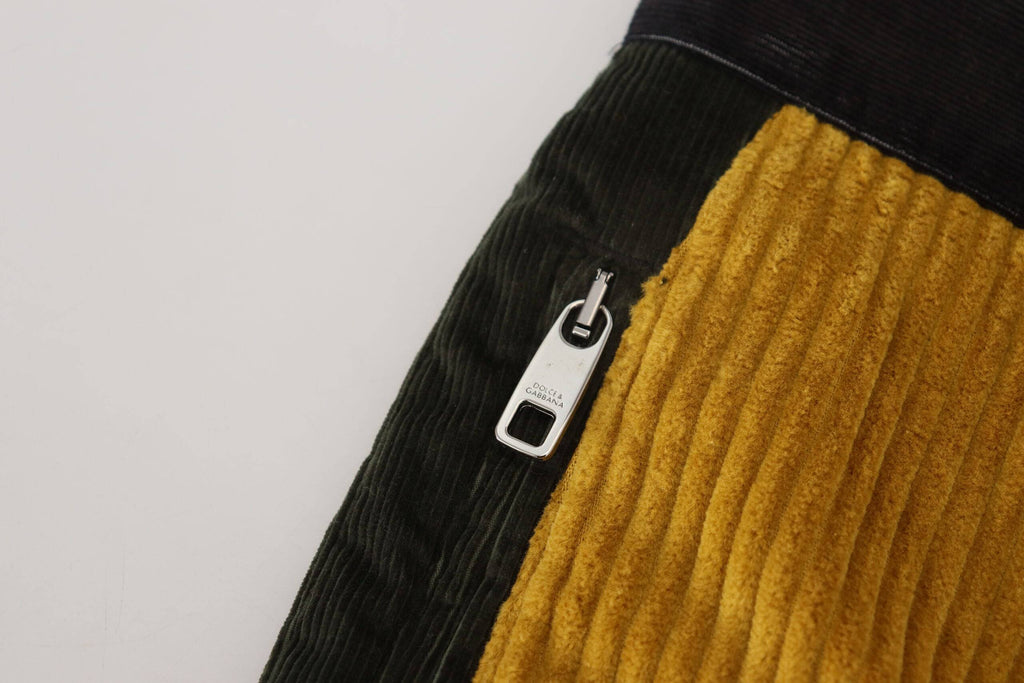Pantalon homme Dolce & Gabbana en coton noir et jaune, style élégant avec coupe moderne et détails sophistiqués.