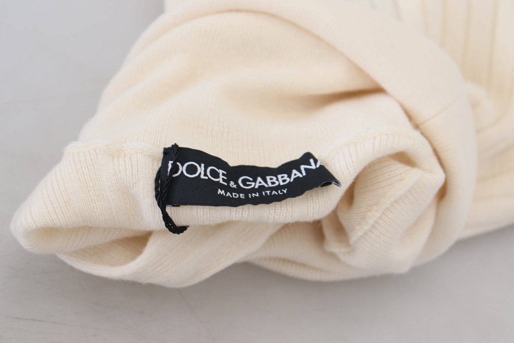 Pull à col roulé blanc cassé Dolce & Gabbana avec poignets déchirés, pull-over en laine élégant et décontracté.