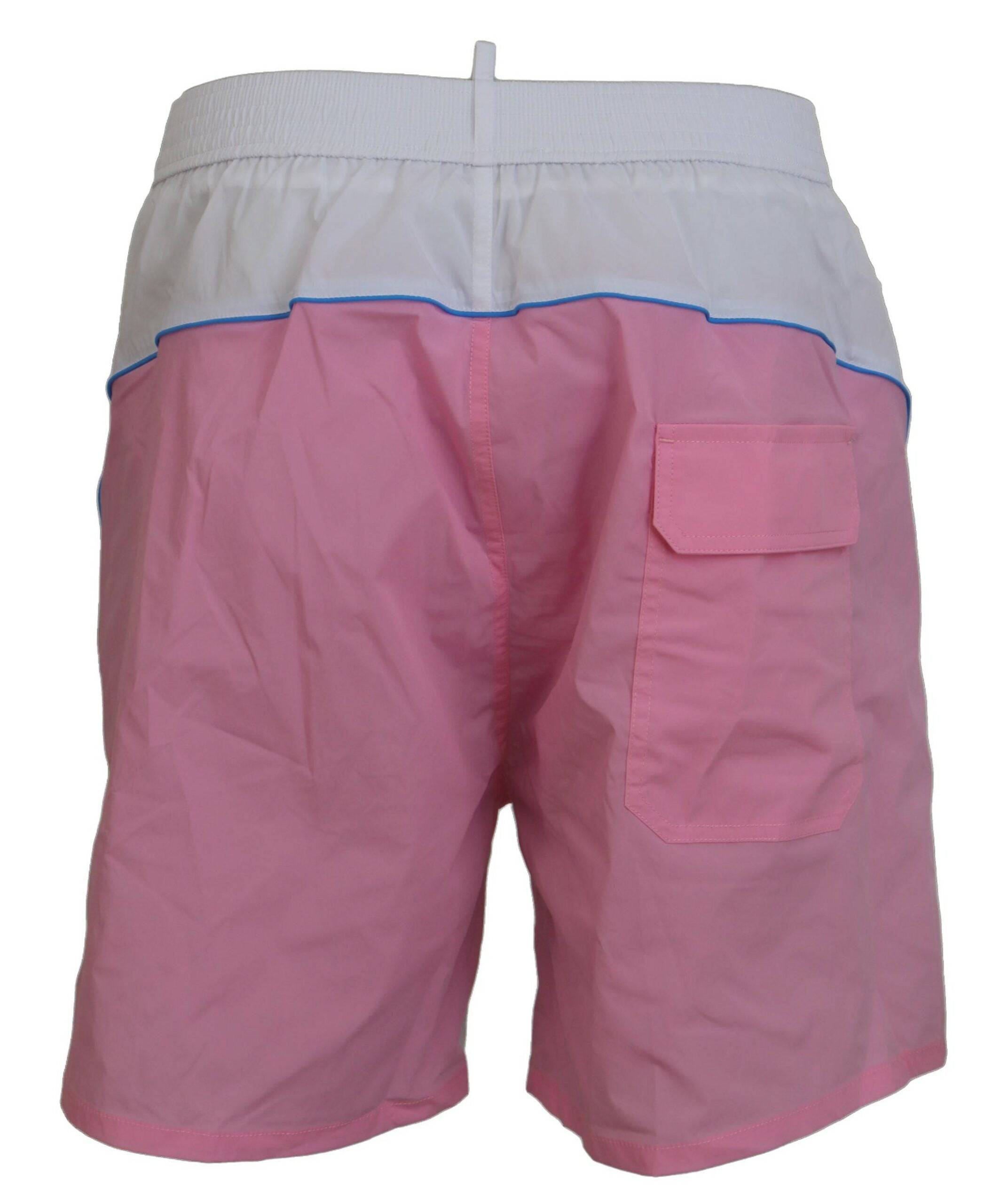 Shorts de bain pour homme Dsquared² blanc avec logo rose, style plage et maillot de bain, en tissu léger et confortable.