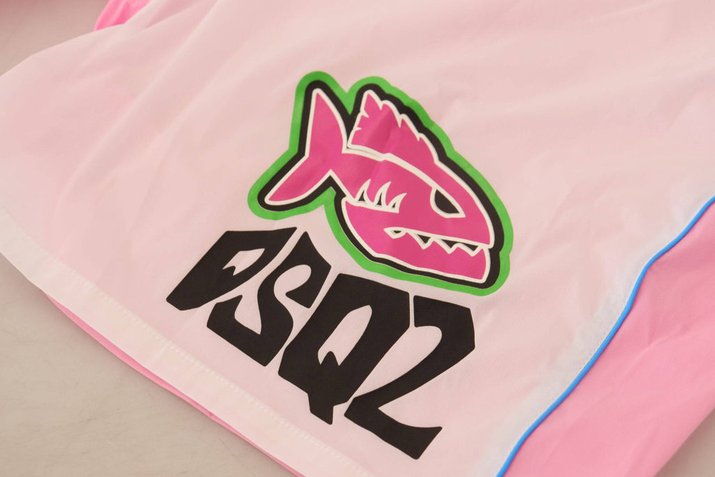 Shorts de bain hommes Dsquared² blancs avec logo rose et imprimé, vêtements de plage élégants et confortables.