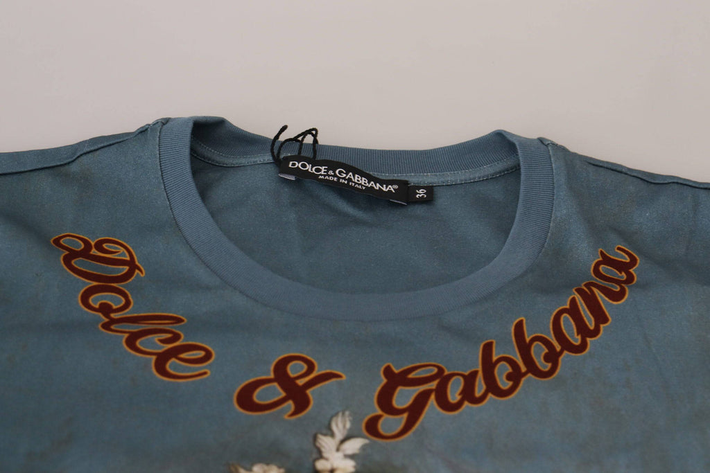 Chemise Dolce & Gabbana multicolore avec logo DG et motif d'ange, tissu léger et style élégant.