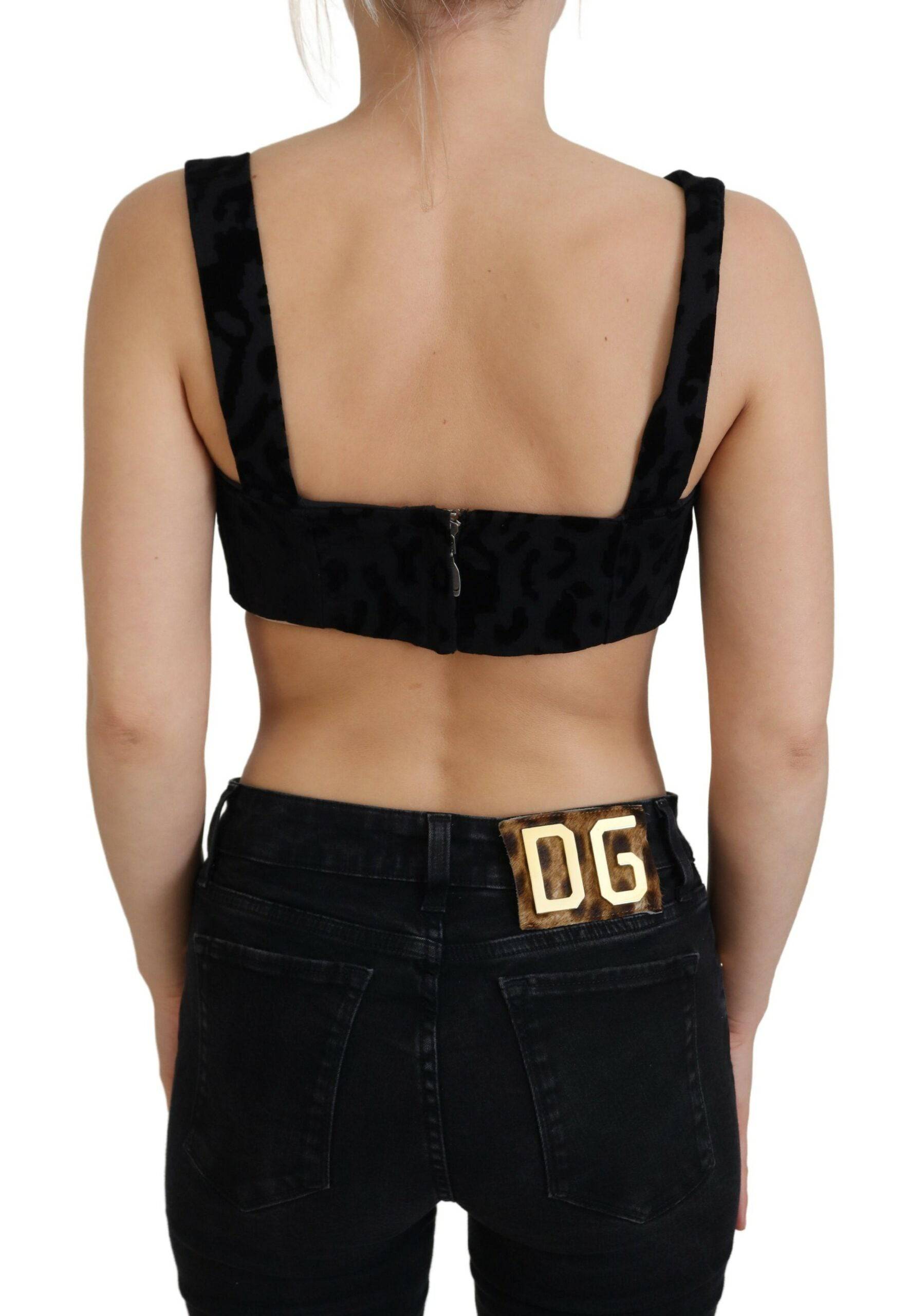 Top corset court Dolce & Gabbana noir à motif léopard, bustier cropé avec détails élégants.