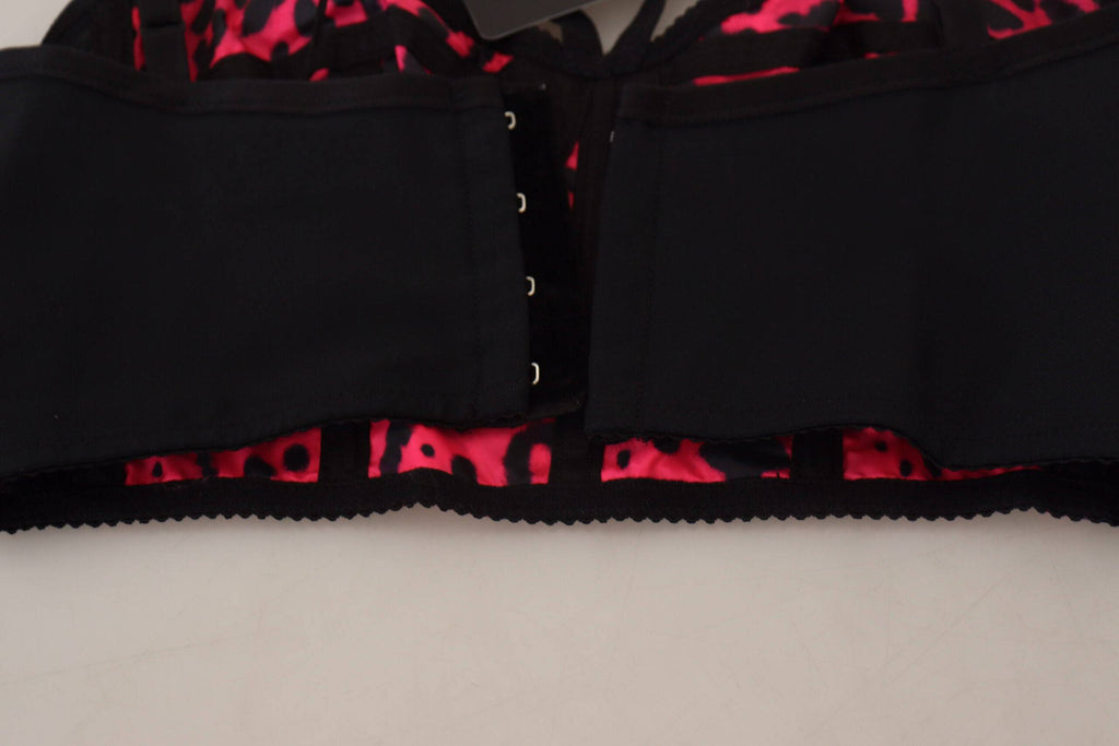 Corset court Dolce & Gabbana à imprimé léopard rose, top bustier cropped en tissu élégant et tendance.