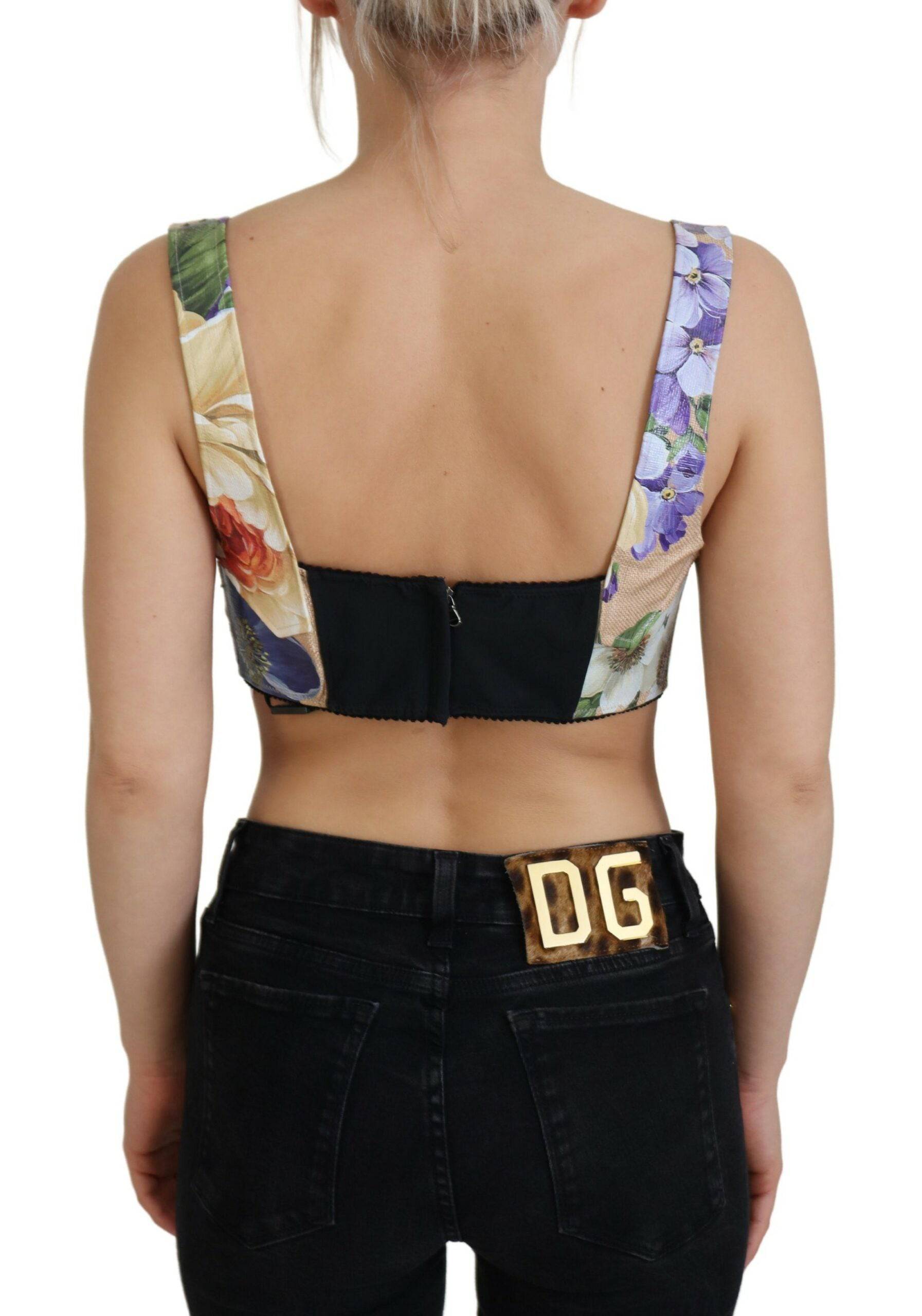 Corset bustier Dolce & Gabbana à fleurs multicolores, coupe courte et style élégant avec détails floraux.