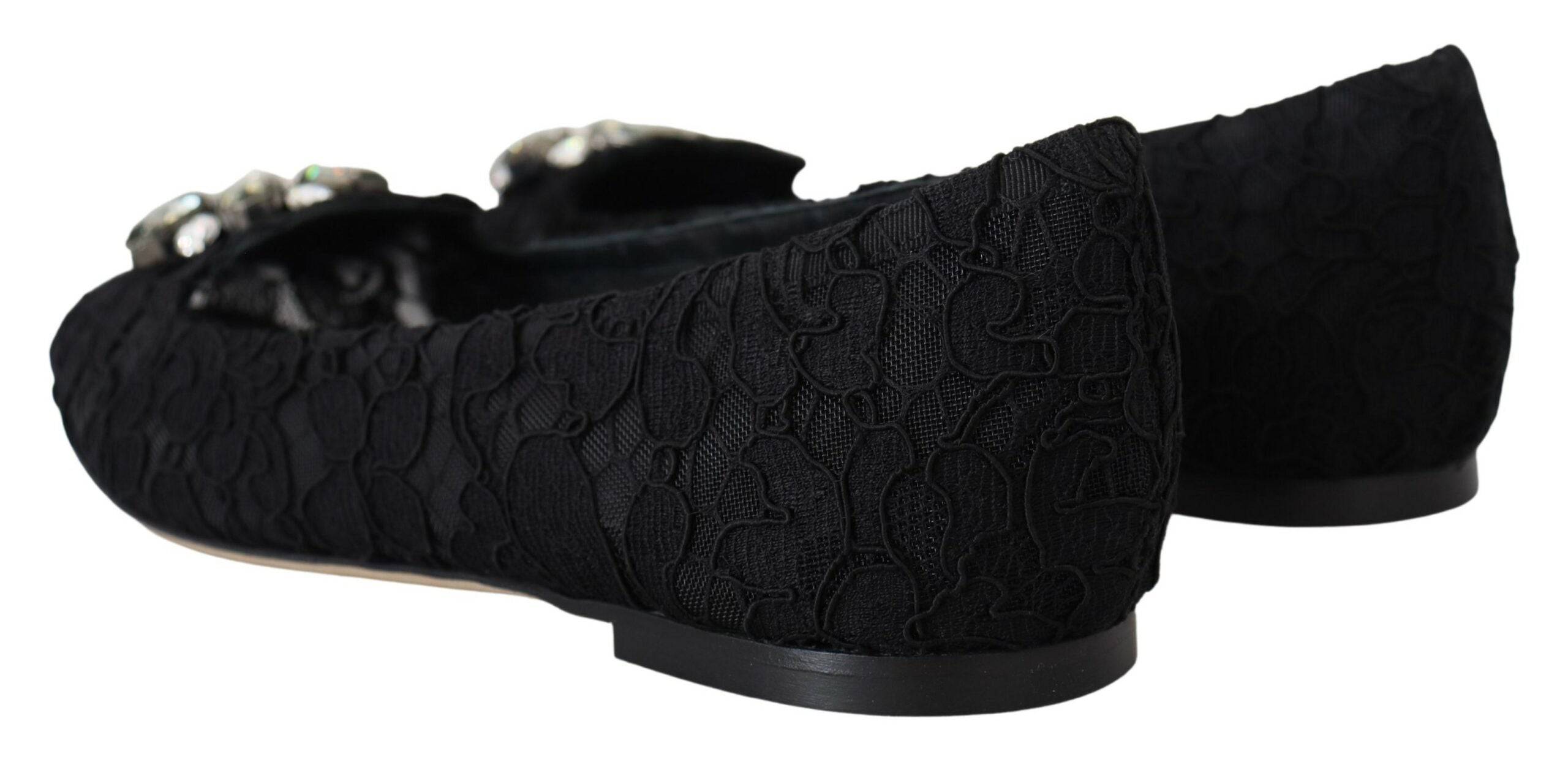 Chaussures plates Dolce & Gabbana Taormina en dentelle noire ornée de cristaux, élégantes et sophistiquées.