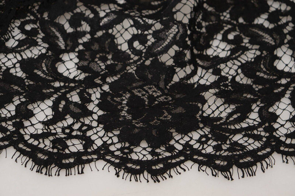 Robe courte Dolce & Gabbana en coton noir avec dentelle florale, silhouette fluide et élégante.