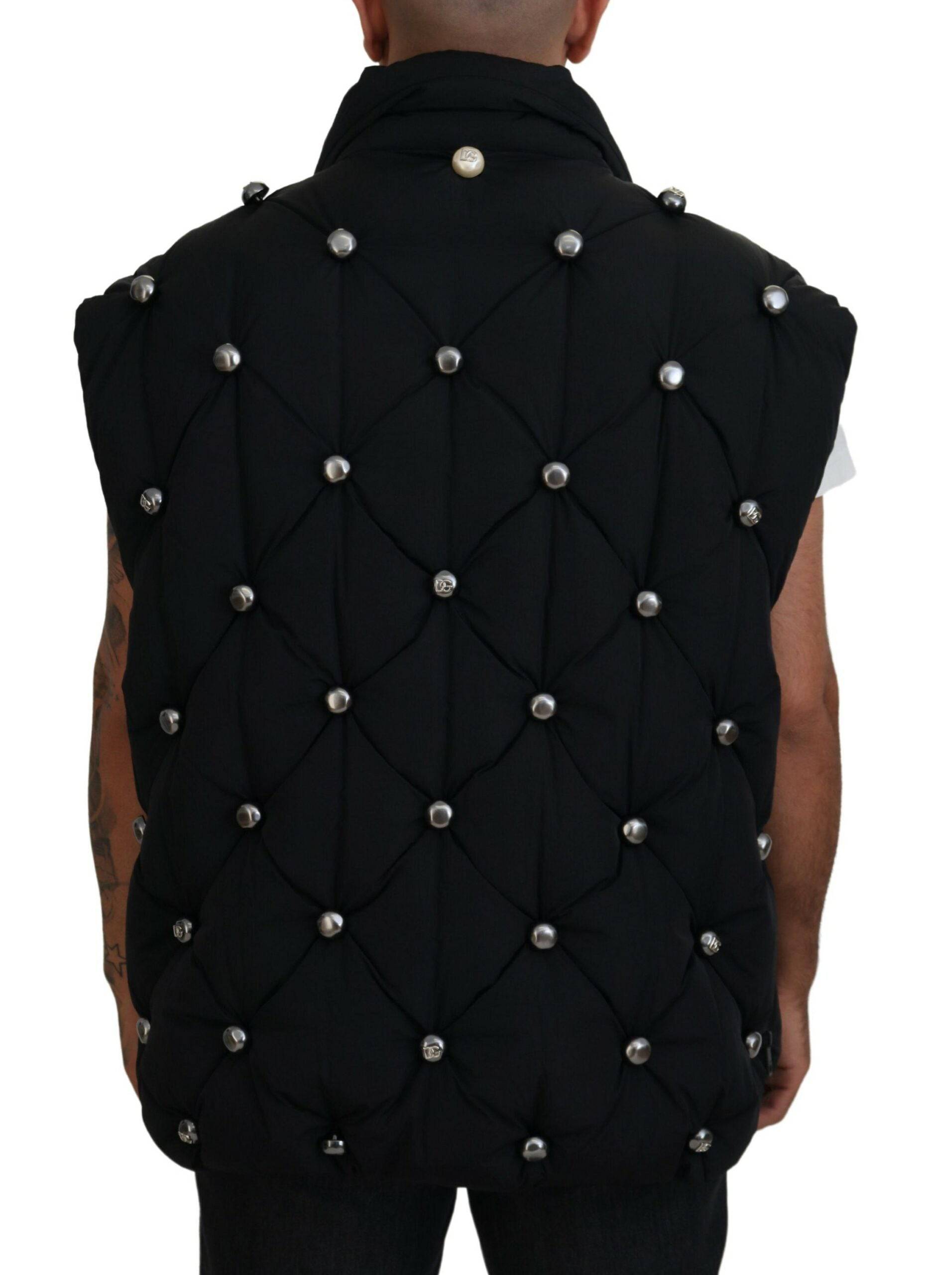 Veste sans manches noire Dolce & Gabbana avec embellissements en métal, style élégant et moderne.