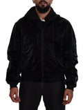 Veste bomber en nylon noir avec capuche et fermeture éclair complète de la marque Dolce & Gabbana, vue de face.