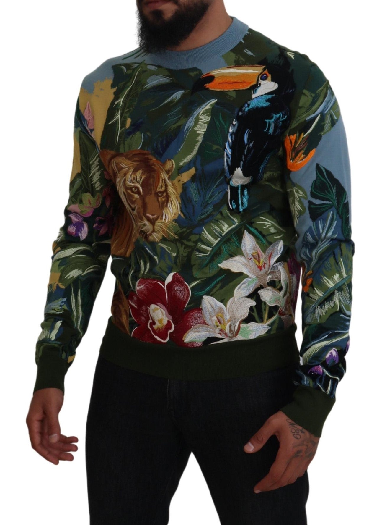 Pull en laine multicolore Dolce & Gabbana Jungle avec logo, motifs sauvages et design élégant visible sur le pull.