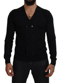 Cardigan en cachemire noir Dolce & Gabbana avec boutons, porté ouvert, détail élégant et doux, parfait pour un look sophistiqué.