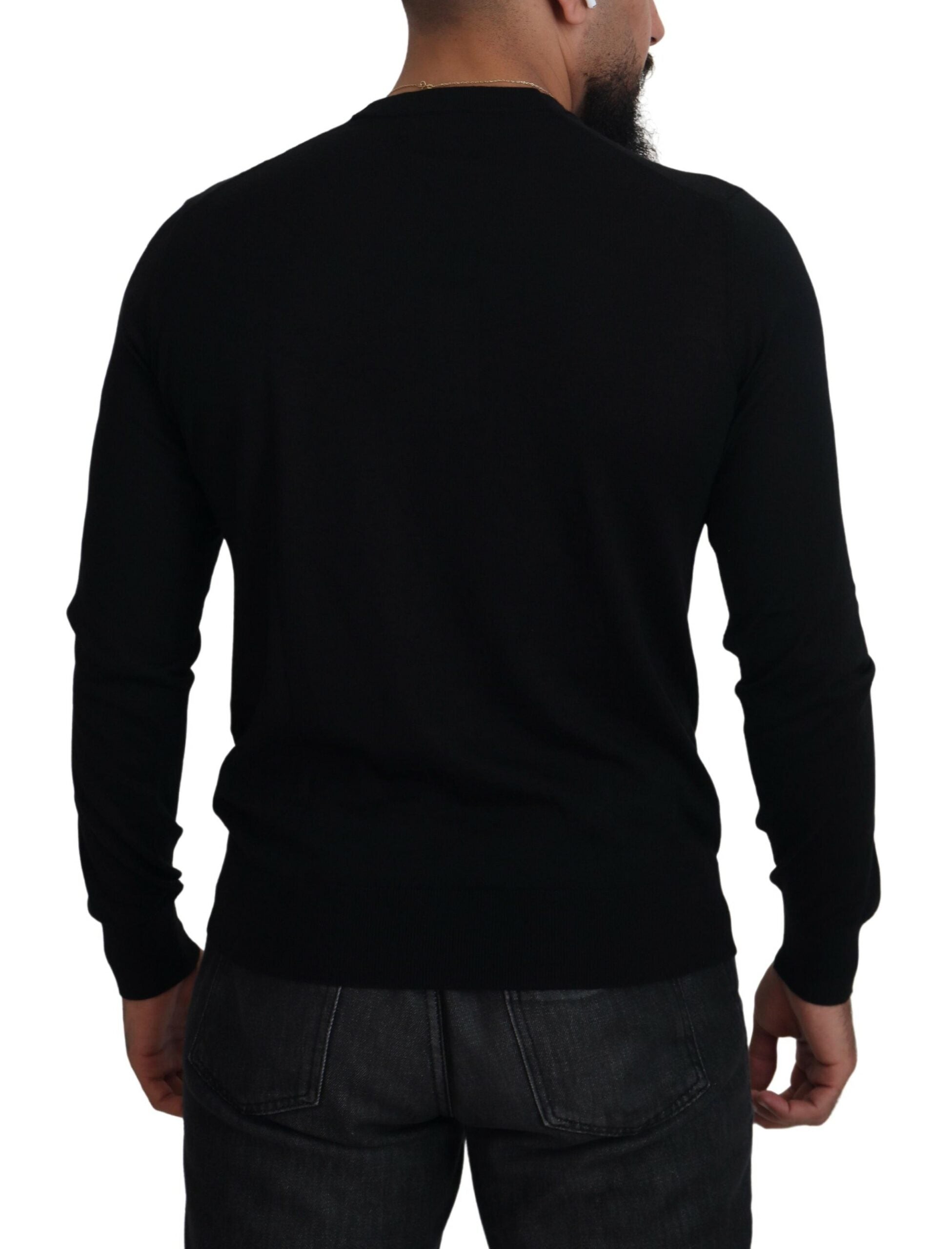 Cardigan Dolce & Gabbana en cachemire noir à boutons, vue de face, vêtements élégants et doux.