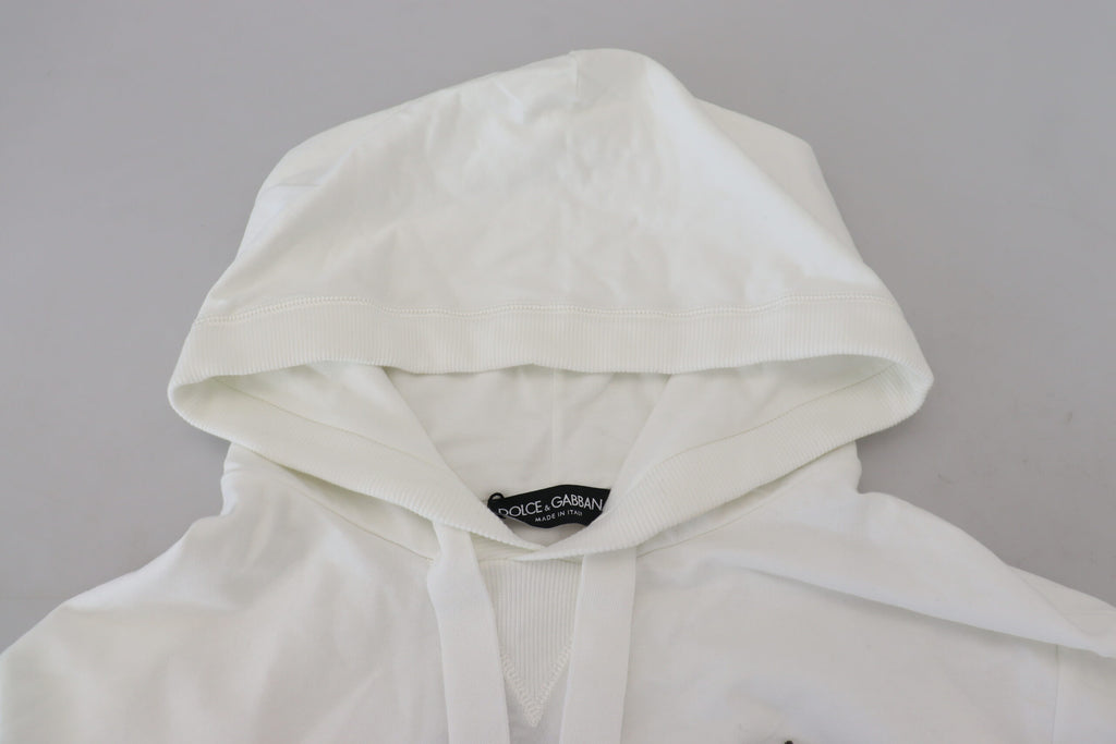 Sweat à capuche en coton blanc de Dolce & Gabbana avec logo, vêtement décontracté et tendance, porté sur un mannequin.