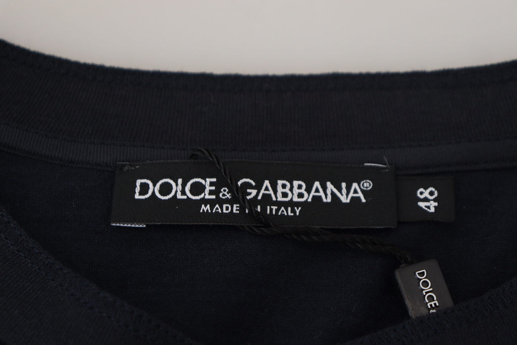 Pull en coton bleu Dolce & Gabbana avec col rond à boutons, vue de face, détail du pull élégant.
