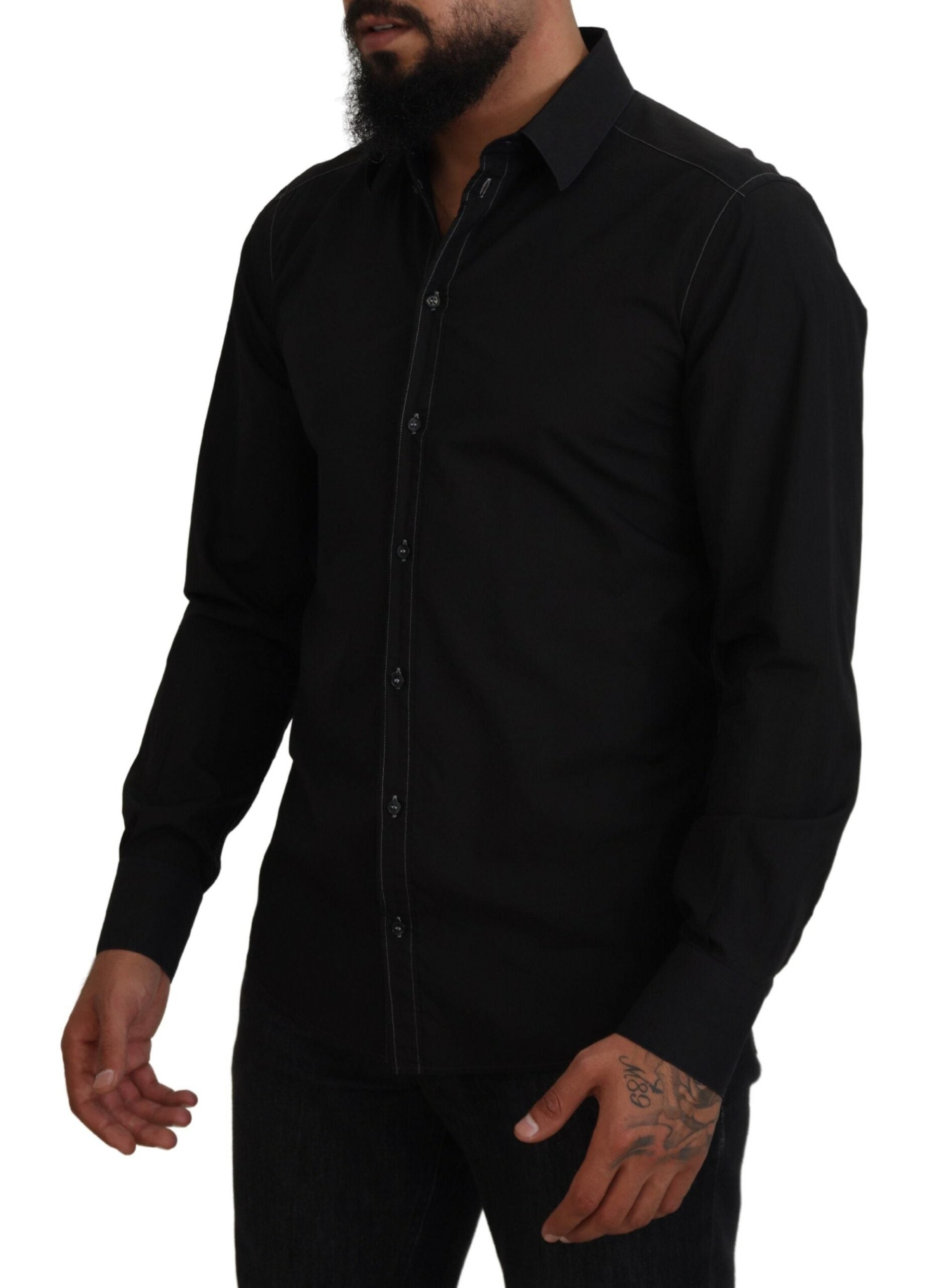 Chemise noire en coton Dolce & Gabbana à col et manches longues avec détails dorés, élégante et sophistiquée.