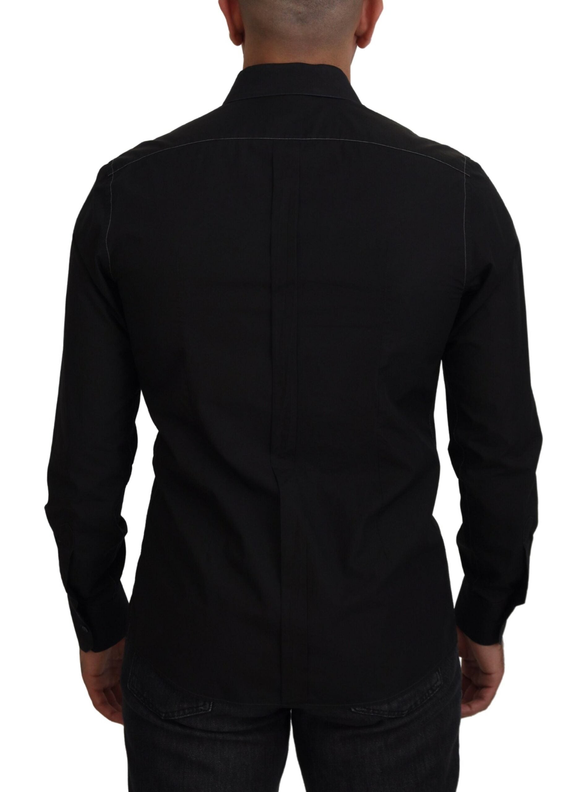 Chemise noire en coton à col avec manches longues Dolce & Gabbana, détail or élégant et sophistiqué.