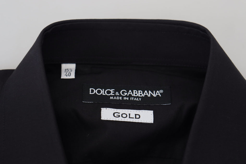 Chemise longue noire pour homme Dolce & Gabbana avec broderie florale dorée et manches longues.