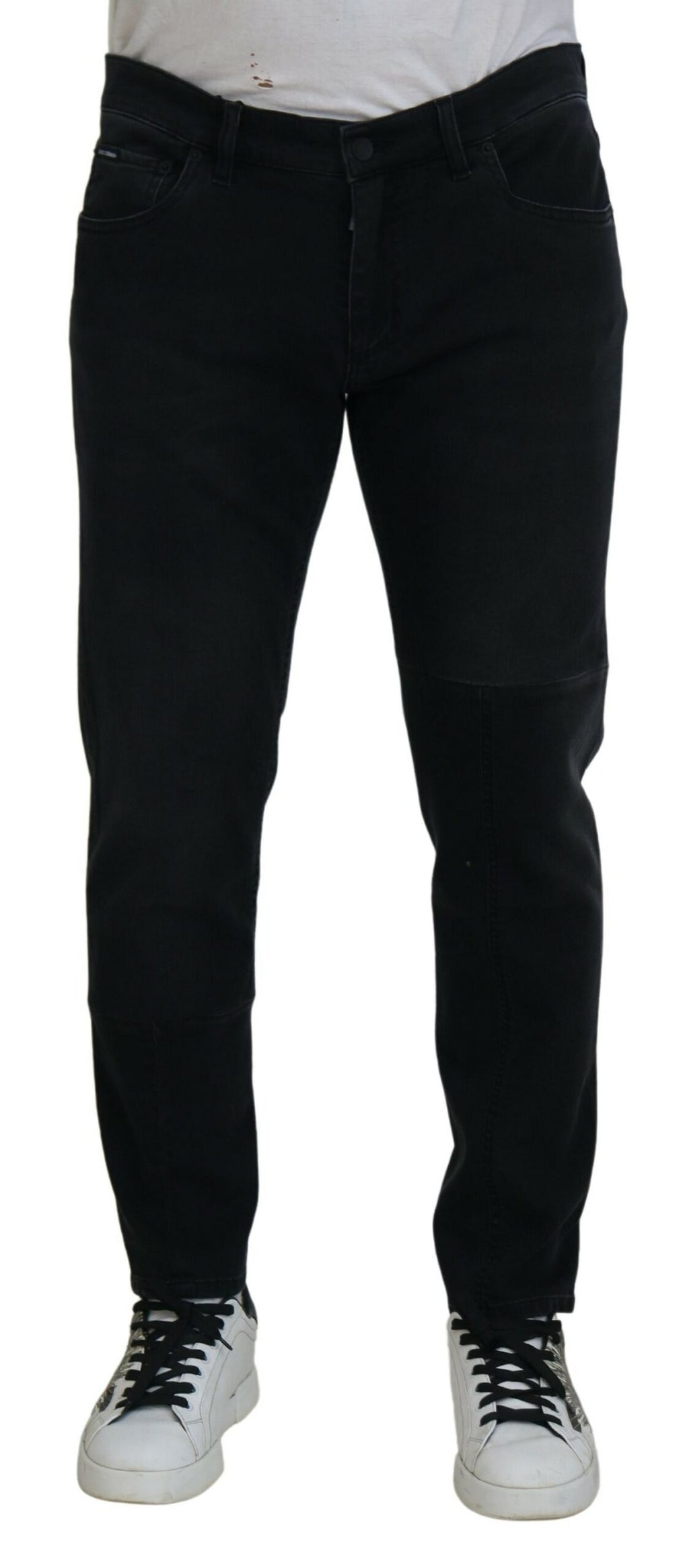Jeans skinny en denim noir Dolce & Gabbana avec broderie d'ange, détails élégants et coupe ajustée.