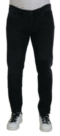 Jeans skinny en denim noir Dolce & Gabbana avec broderie d'ange, détails élégants et coupe ajustée.